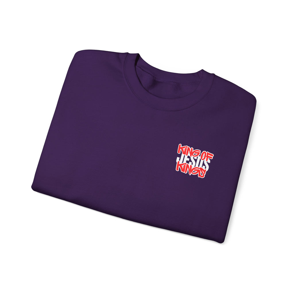 Purple sweater folded with small 'King of Kings' chest logo