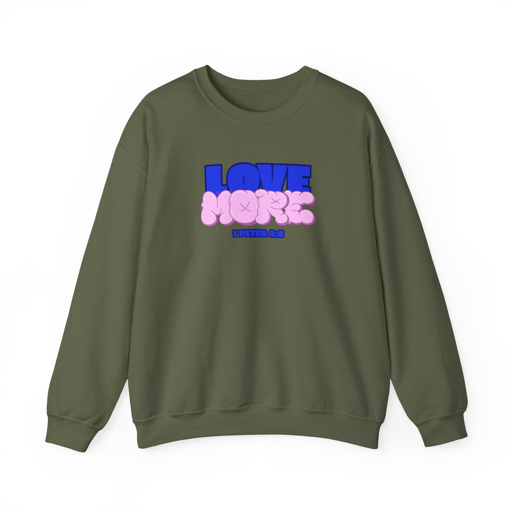 Love More sweater in military green, crewneck with blue LOVE graphic and pink plush-style shapes