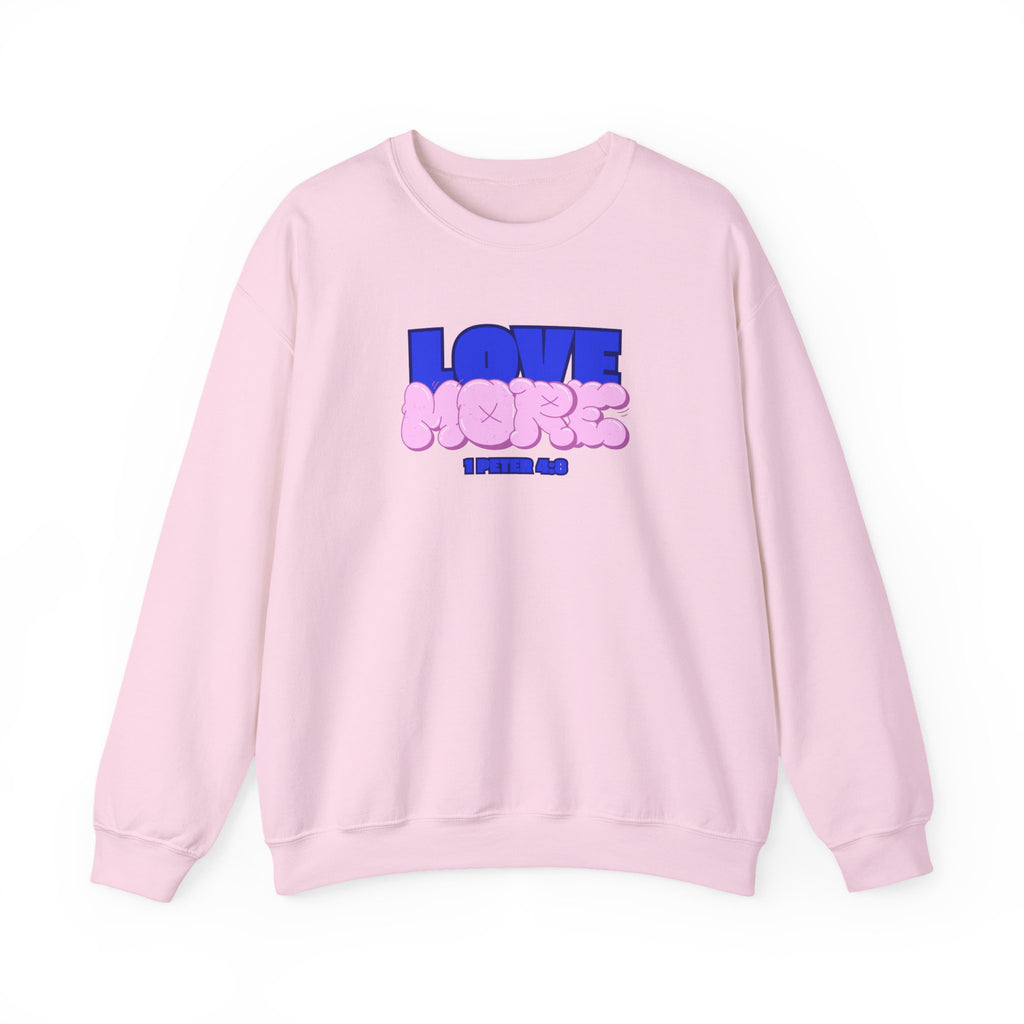 Light pink crewneck sweater with long sleeves; pink LOVE graphic and text on front