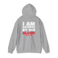 Light gray hoodie with back print reading “I AM COVERED BY HIS BLOOD”