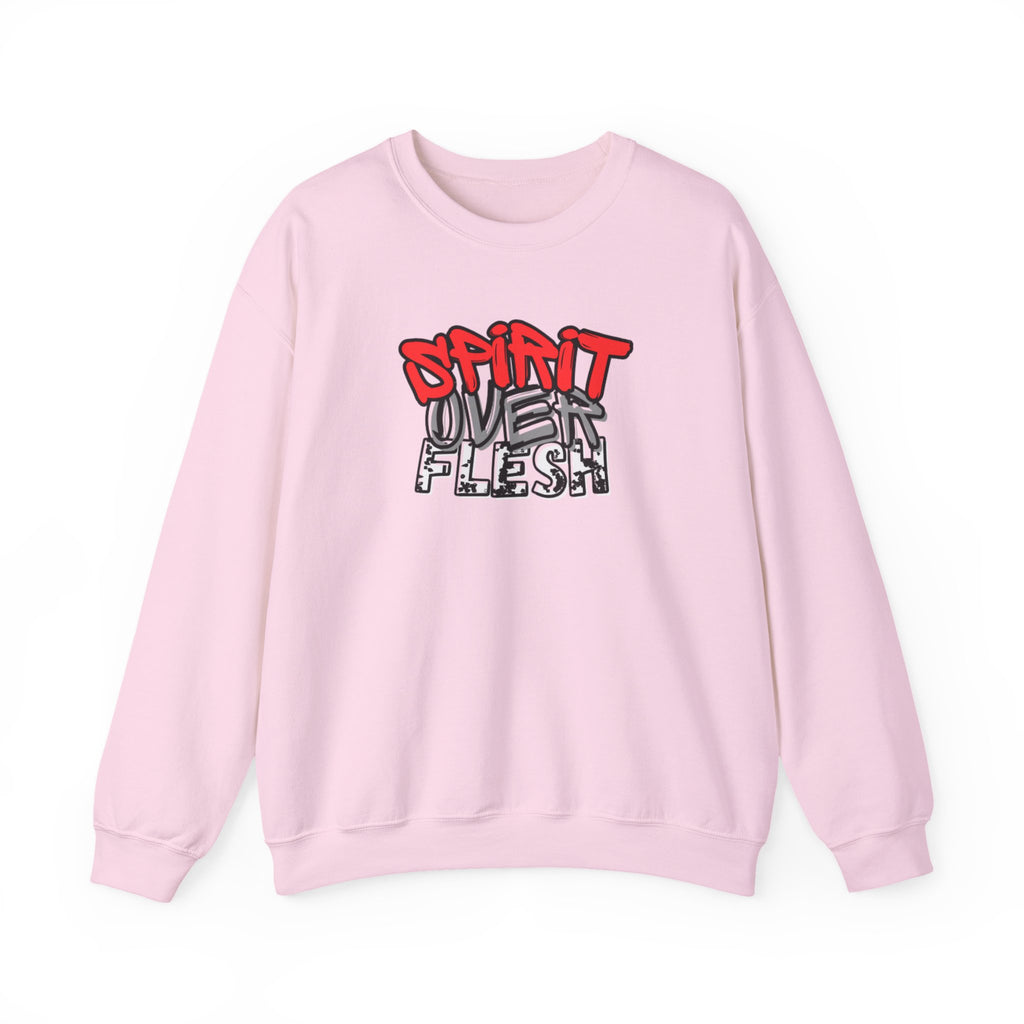 Pink crewneck sweater with long sleeves and Spirit Over Flesh chest graphic