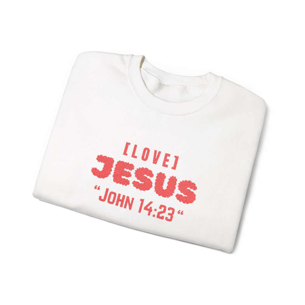 White crewneck sweater with “I LOVE JЕSUS” and “JOHN 14:23” graphic