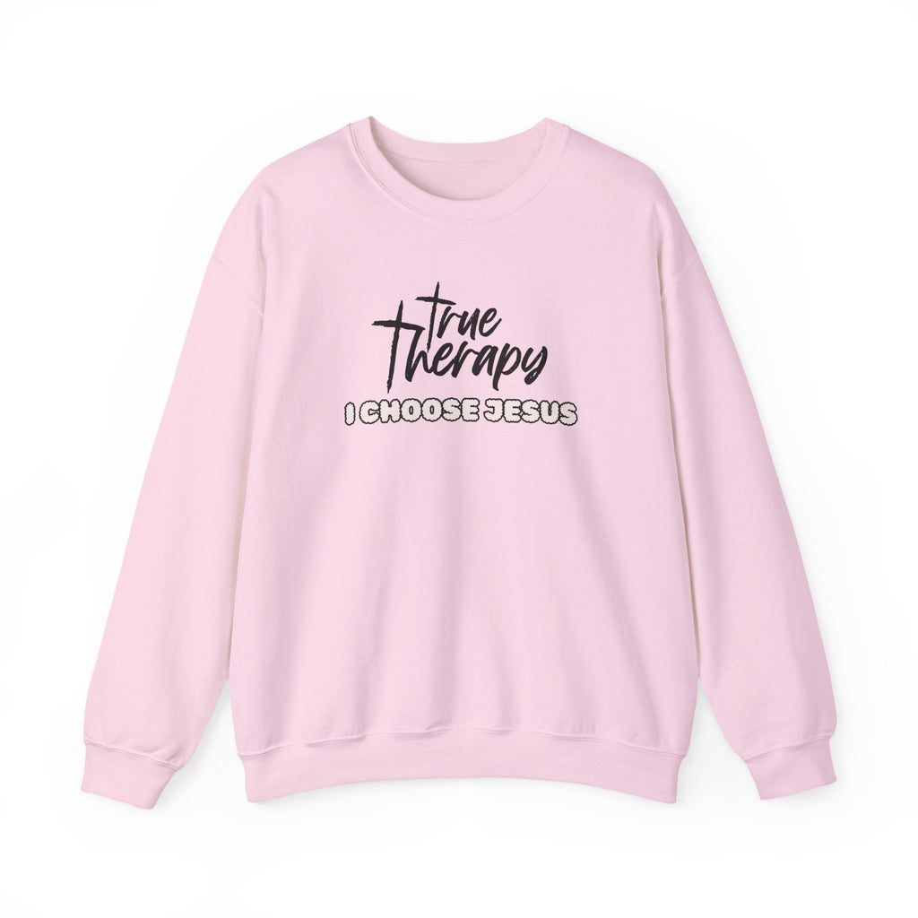 Light pink crewneck sweater with long sleeves and front graphic print